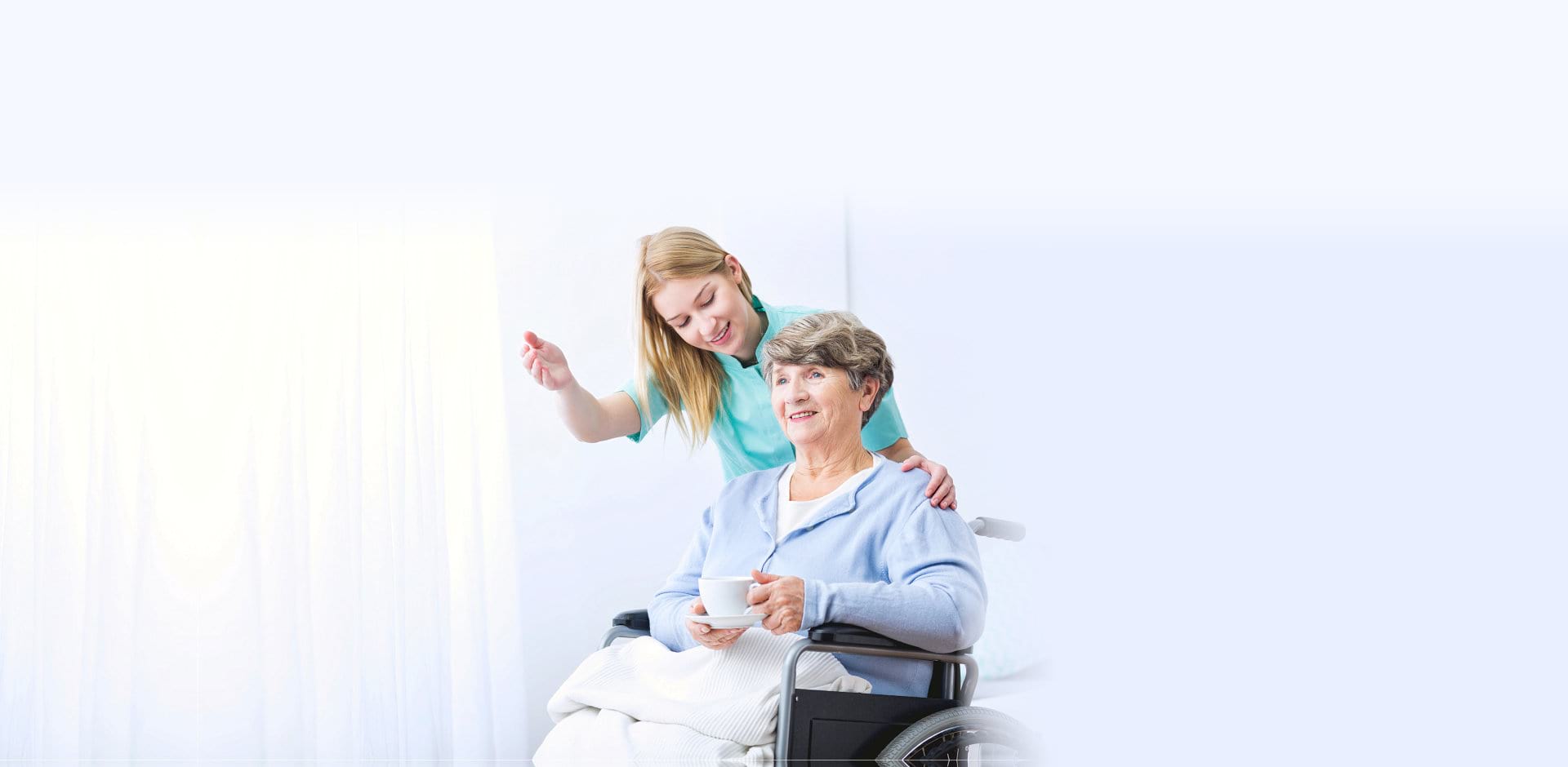 caregiver and senior woman in a wheelchair